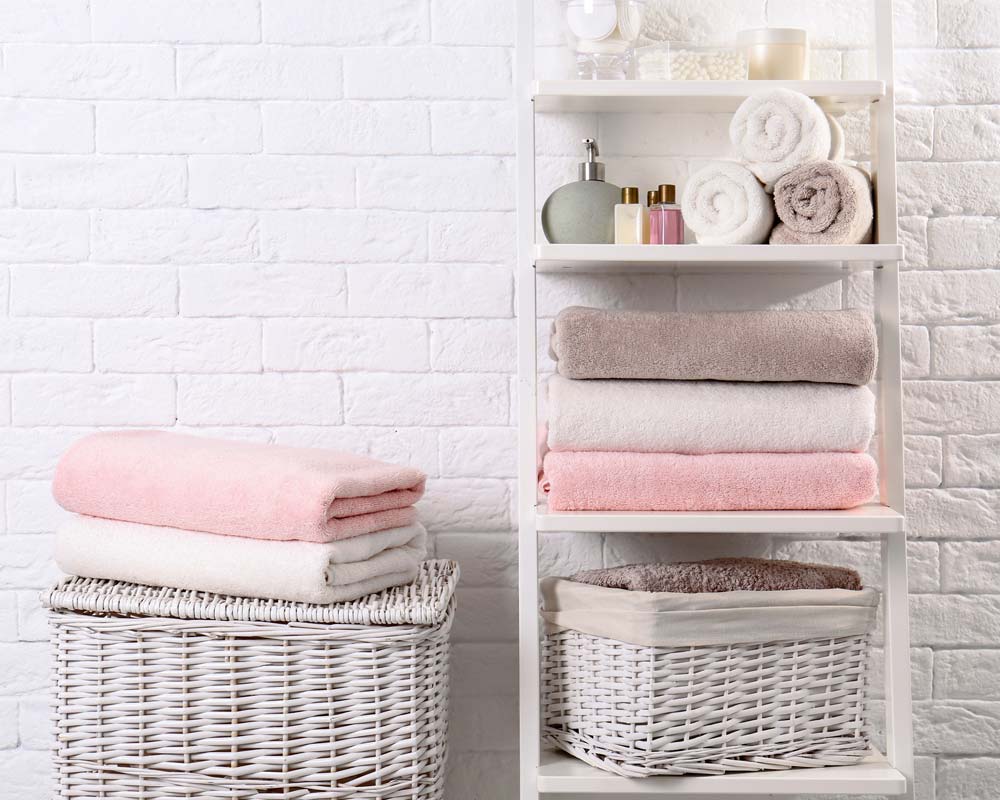 Storage stack of pink towels