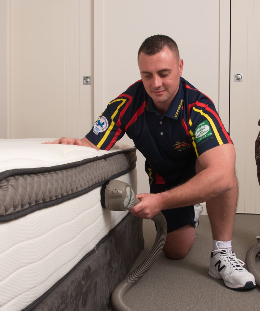 Electrodry Technician Vacuuming the Mattress