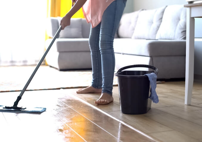 Woman Mopping Timber Floor