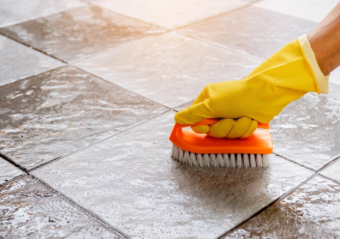 Brushing Bathroom Floor