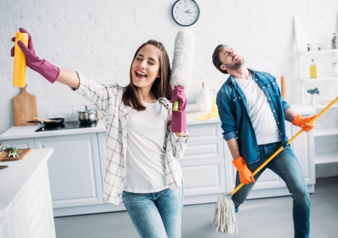 Couple Having fun together on Cleaning