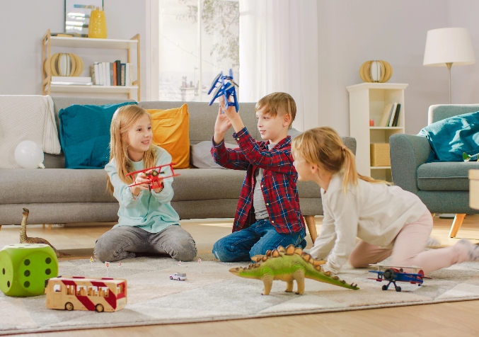 Children playing toys in a living room