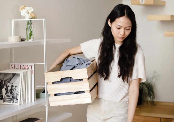 Girl Cleaning Up Trinkets