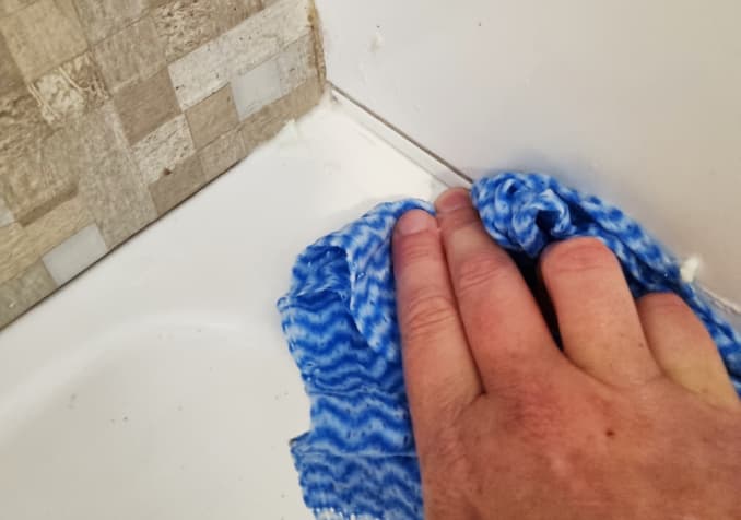Electrodry - How to Clean Grimy Bathroom Floor Corners - Wiping Bathroom Tiles