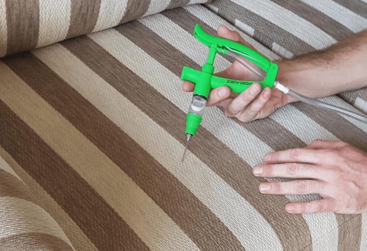 Electrodry Injecting Urine Treatment Chemicals in Couch